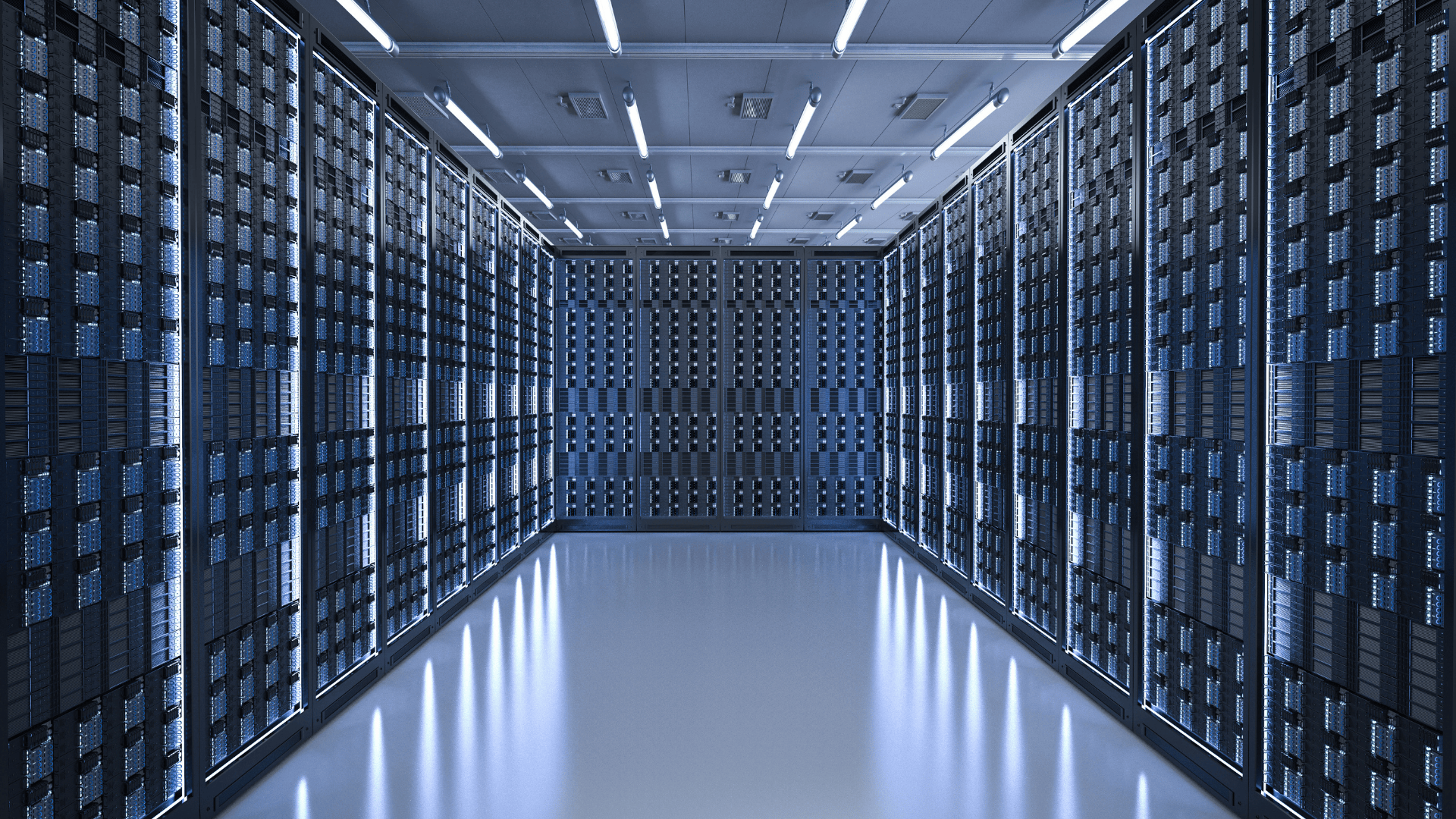 Modern data center with rows of illuminated server racks and advanced cooling system.